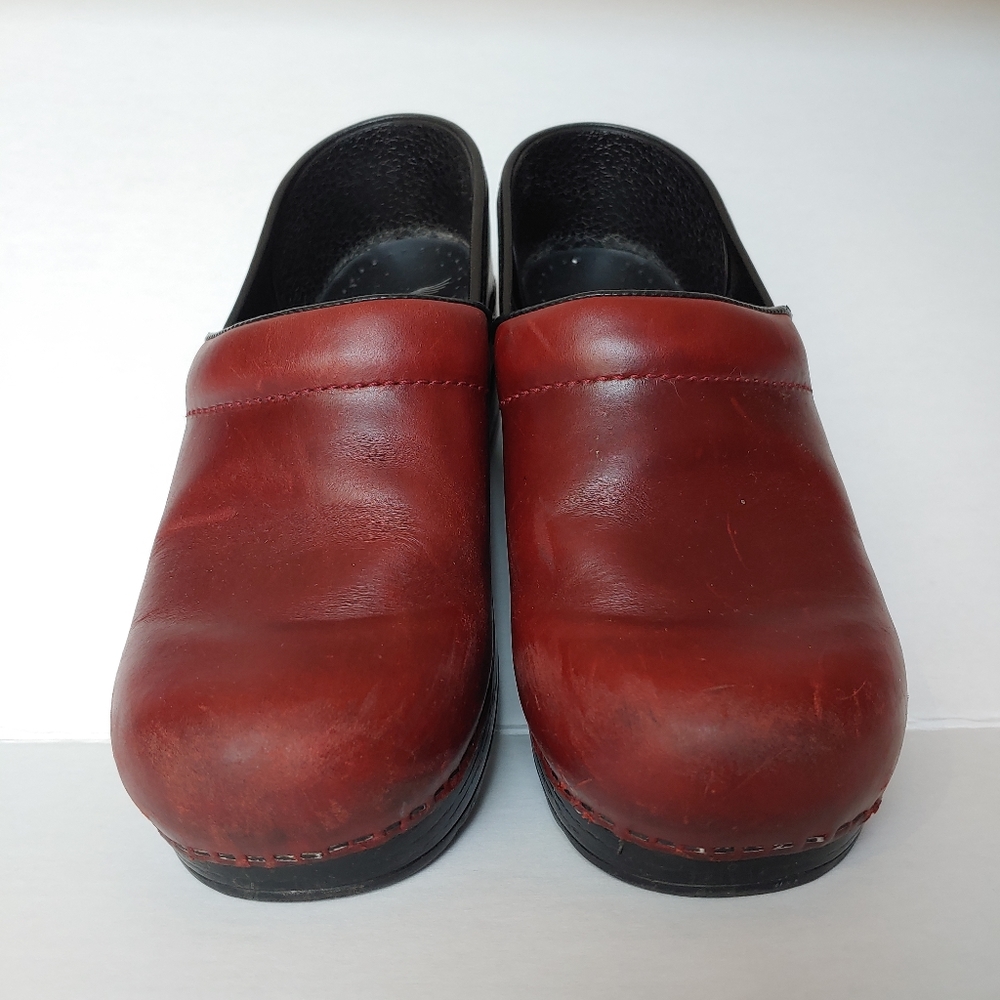 Dansko reddish brown clogs
